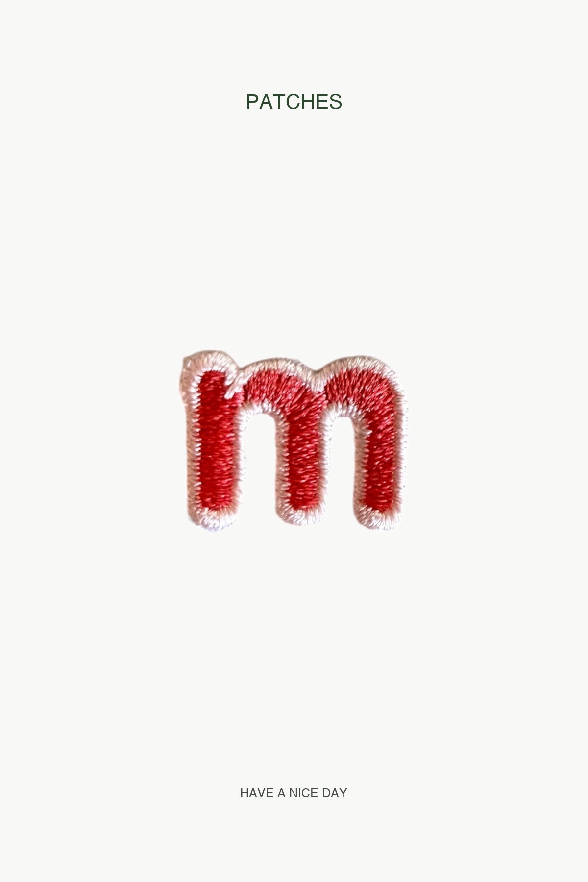 Lowercase m Alphabet Patch — branded PATCHES display card