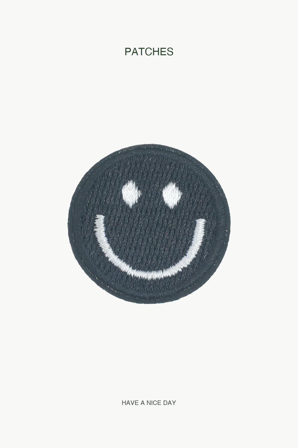 Black Smiling Face Patch — branded PATCHES display card