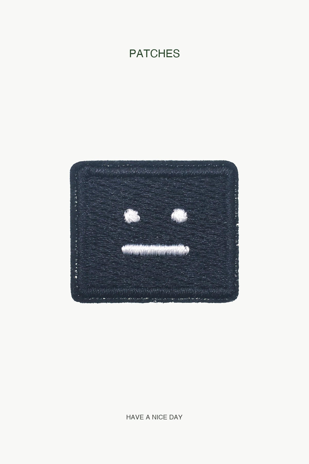 Black Square Face Patch — branded PATCHES display card