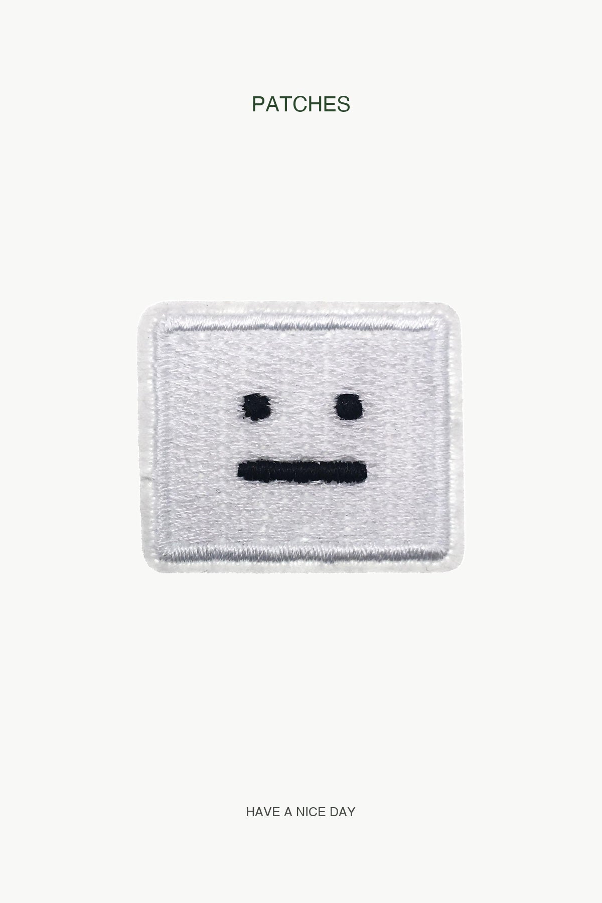 White Square Face Patch — branded PATCHES display card
