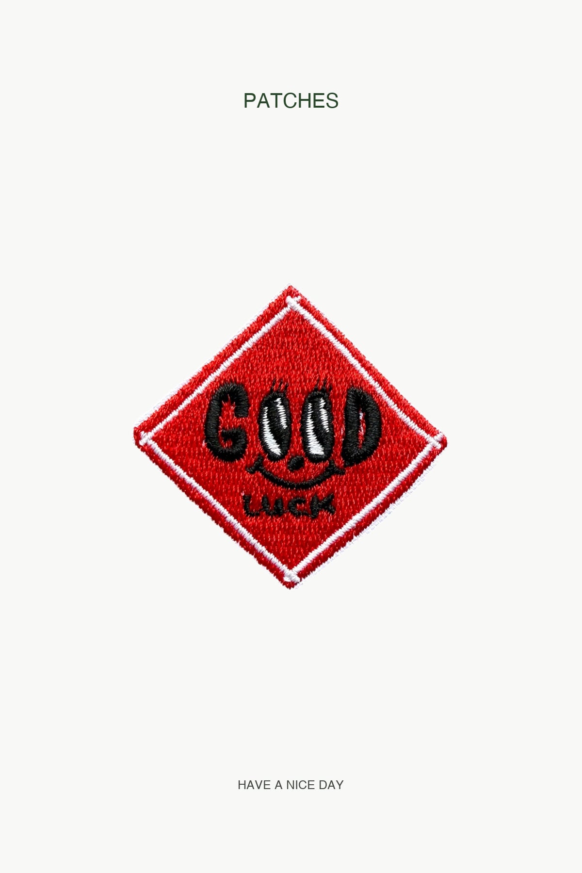 "GOOD LUCK" Door Couplet Patch — branded PATCHES display card
