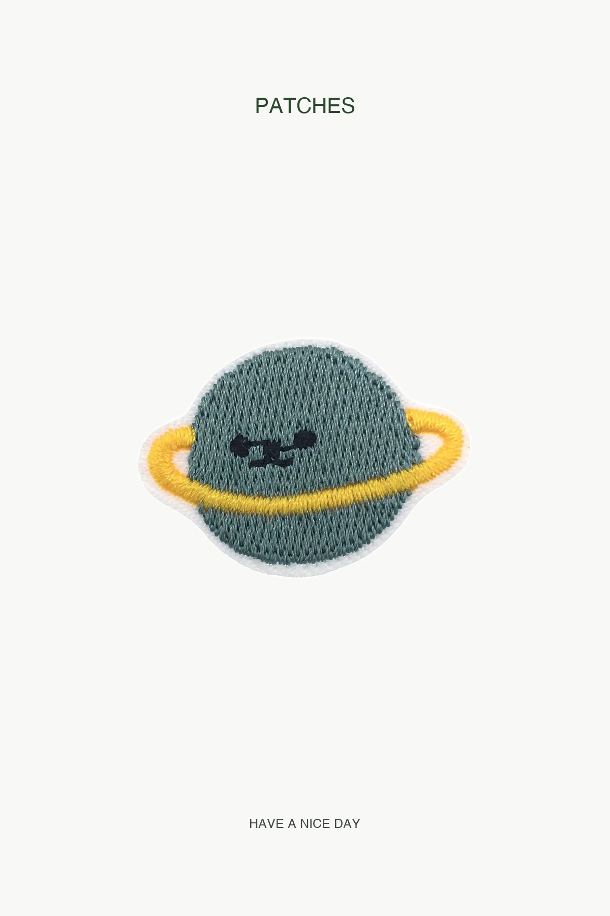 Green Saturn Patch — branded PATCHES display card