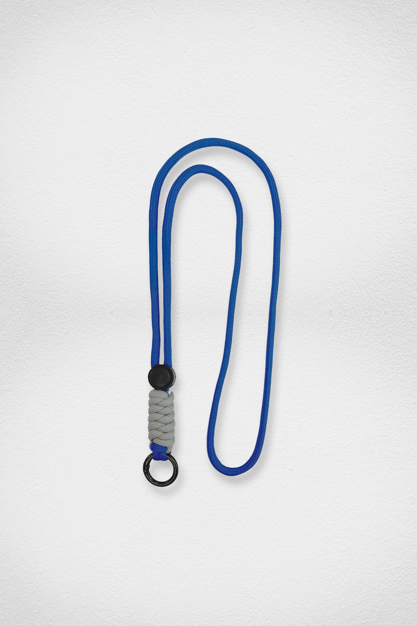 Blue and gray lanyard with a black ring on a white background