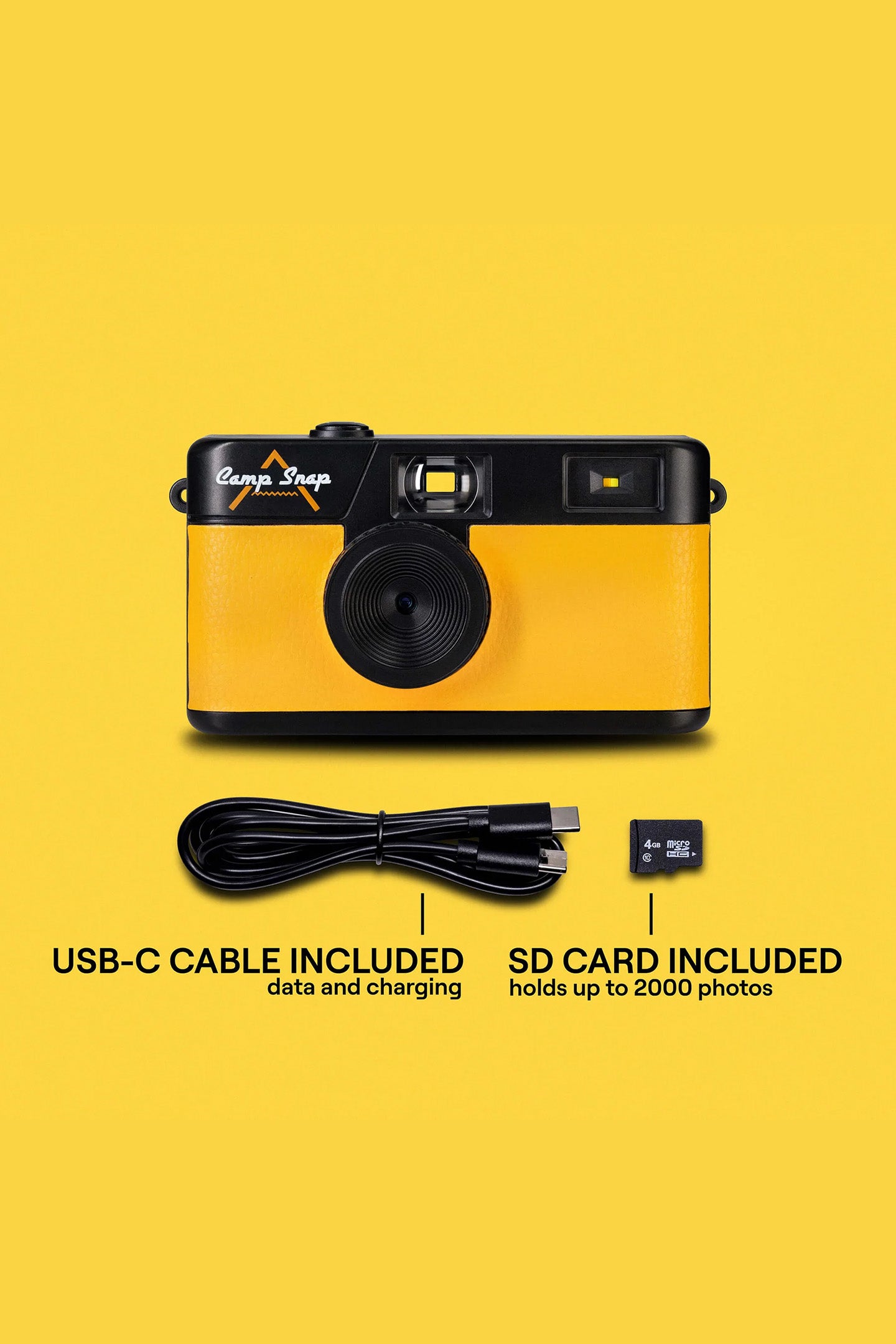 camp snap camera with USB-C cable and SD card on a yellow background